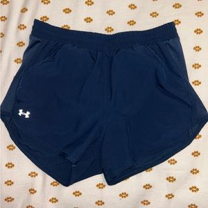 Small, navy blue loose HeatGear Under Armor shorts